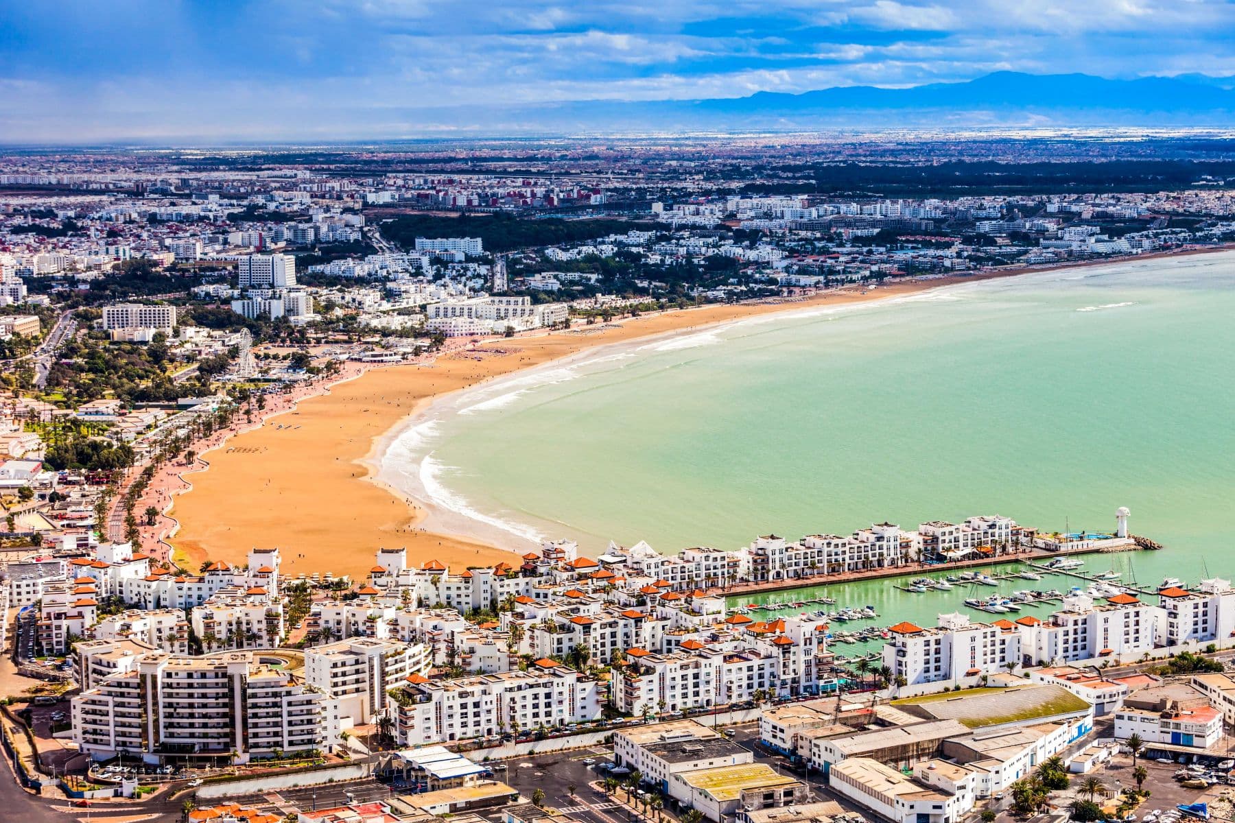 Sweeping view of Agadir's Atlantic bay, beachfront promenade, and coastline