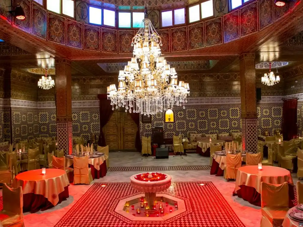 Ornate Moroccan palace architecture and carved cedar ceilings at Dar Essalam